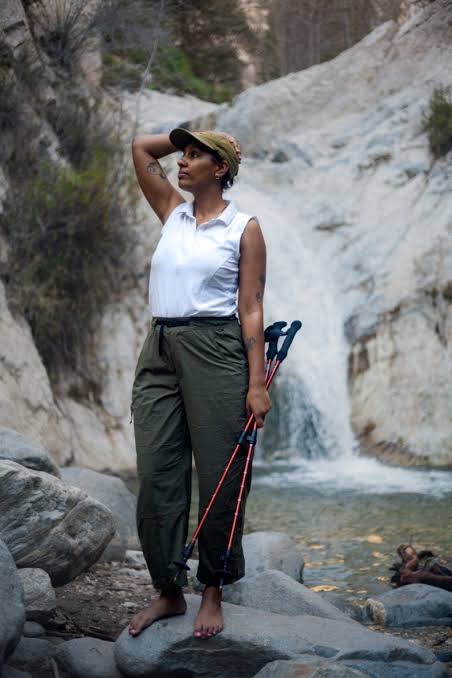 Olive Green Cargo Pants with White Sleeveless Polo — Hiking Outfits