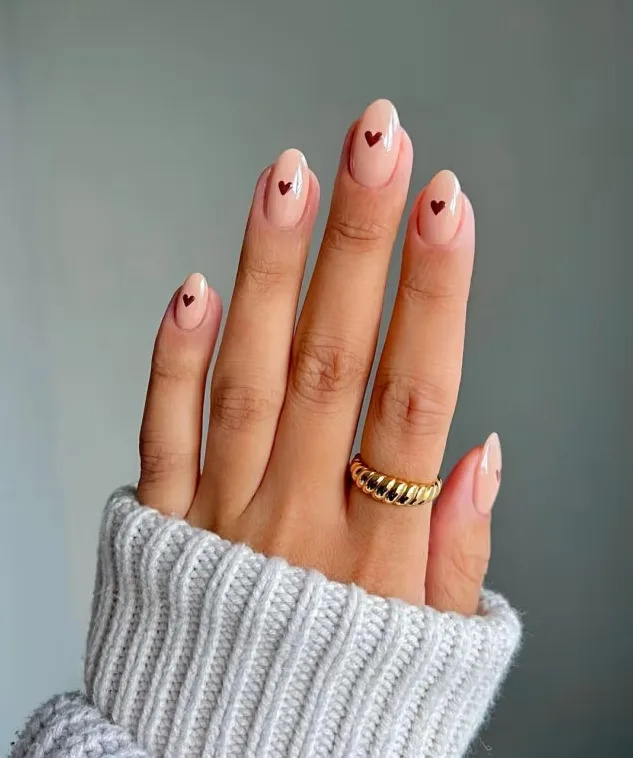 Medium Oval Nude Beige With Brown Hearts Medium Oval Nude Beige With Brown Hearts — Heart Nails