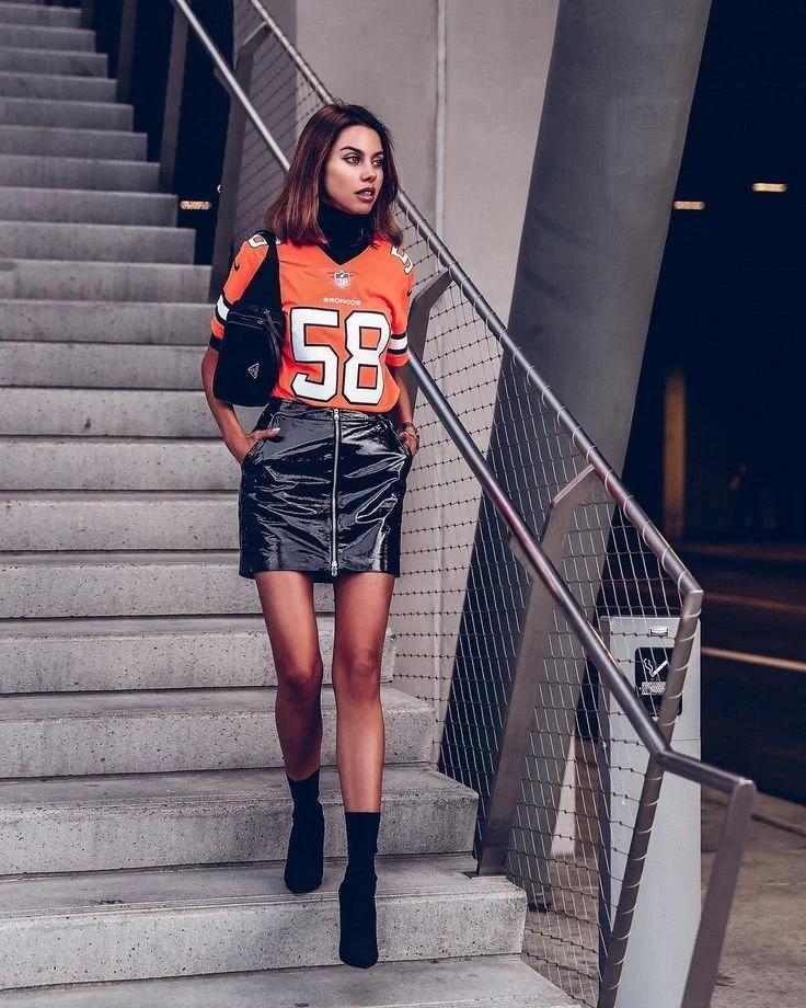 Sports Jersey Over Turtleneck with Vinyl Mini Skirt Sports Jersey Over Turtleneck with Vinyl Mini Skirt — Jersey Outfits