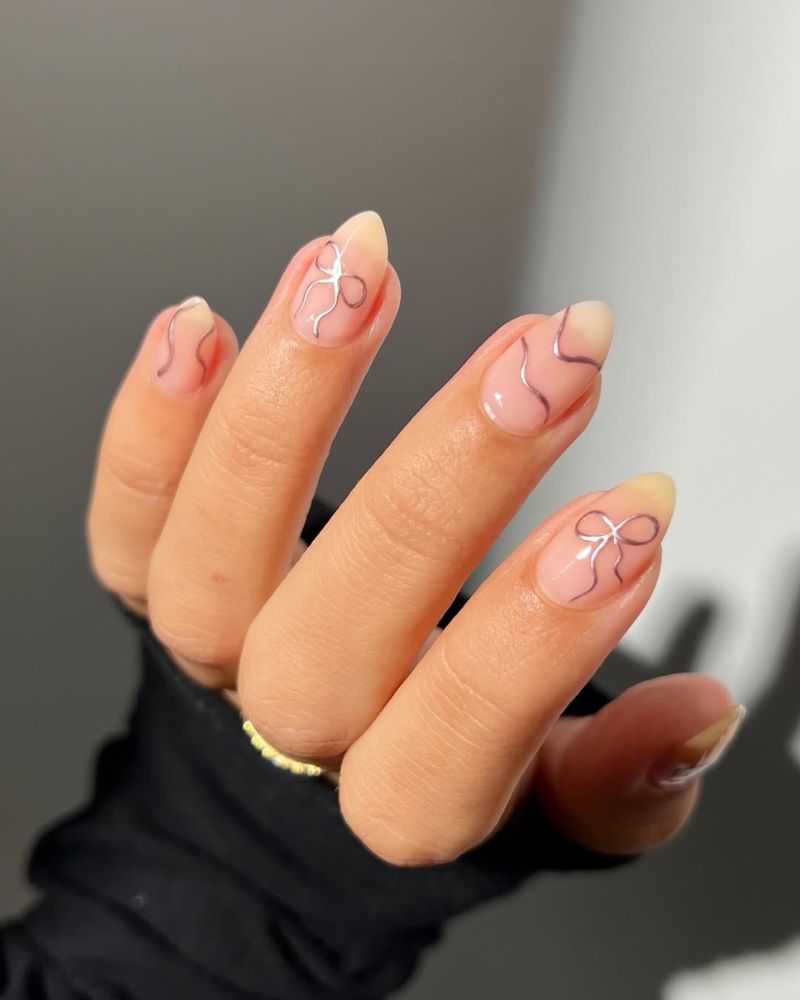 Metallic Silver Line Bow Stiletto Nails Metallic Silver Line Bow Stiletto Nails — Bow Nails