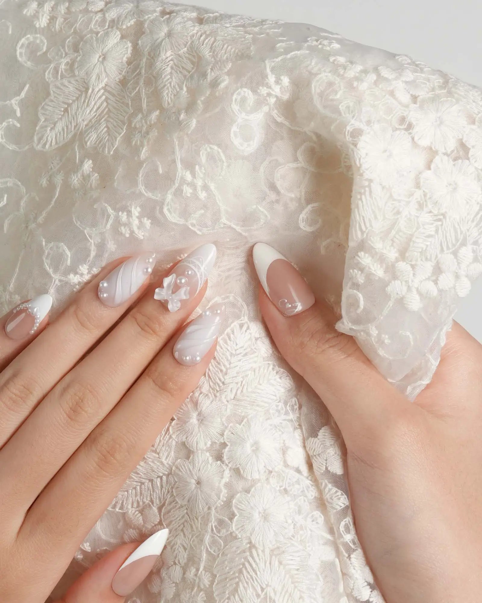Pearls 3D Floral Accent French Tips Visual Idea Pearls 3D Floral Accent French Tips Visual Idea — Engagement Nails