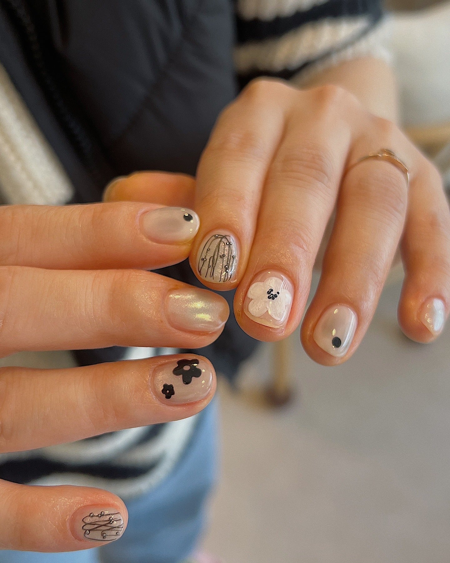Sheer Nude With Black Floral Art — Very Short Nails