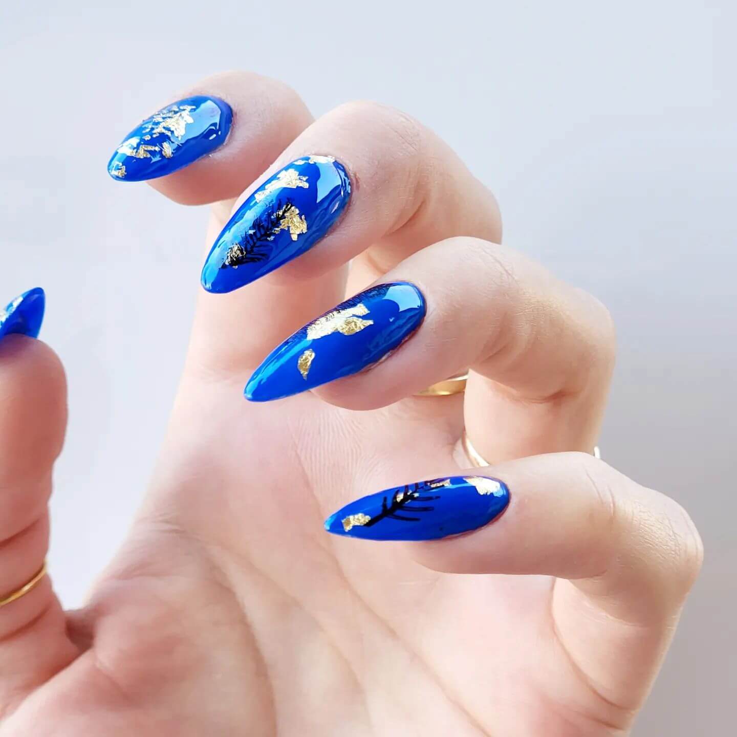 Royal Blue with Gold Foil & Leaf Art Medium Almond Nails Royal Blue with Gold Foil & Leaf Art Medium Almond Nails — Royal Blue Nails