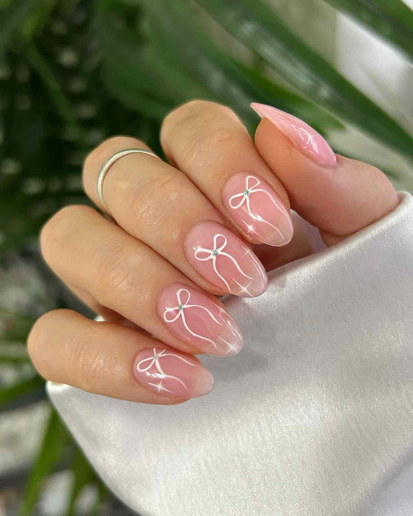 Sheer Pink Bow Rhinestone Nails — Pink and White Nails