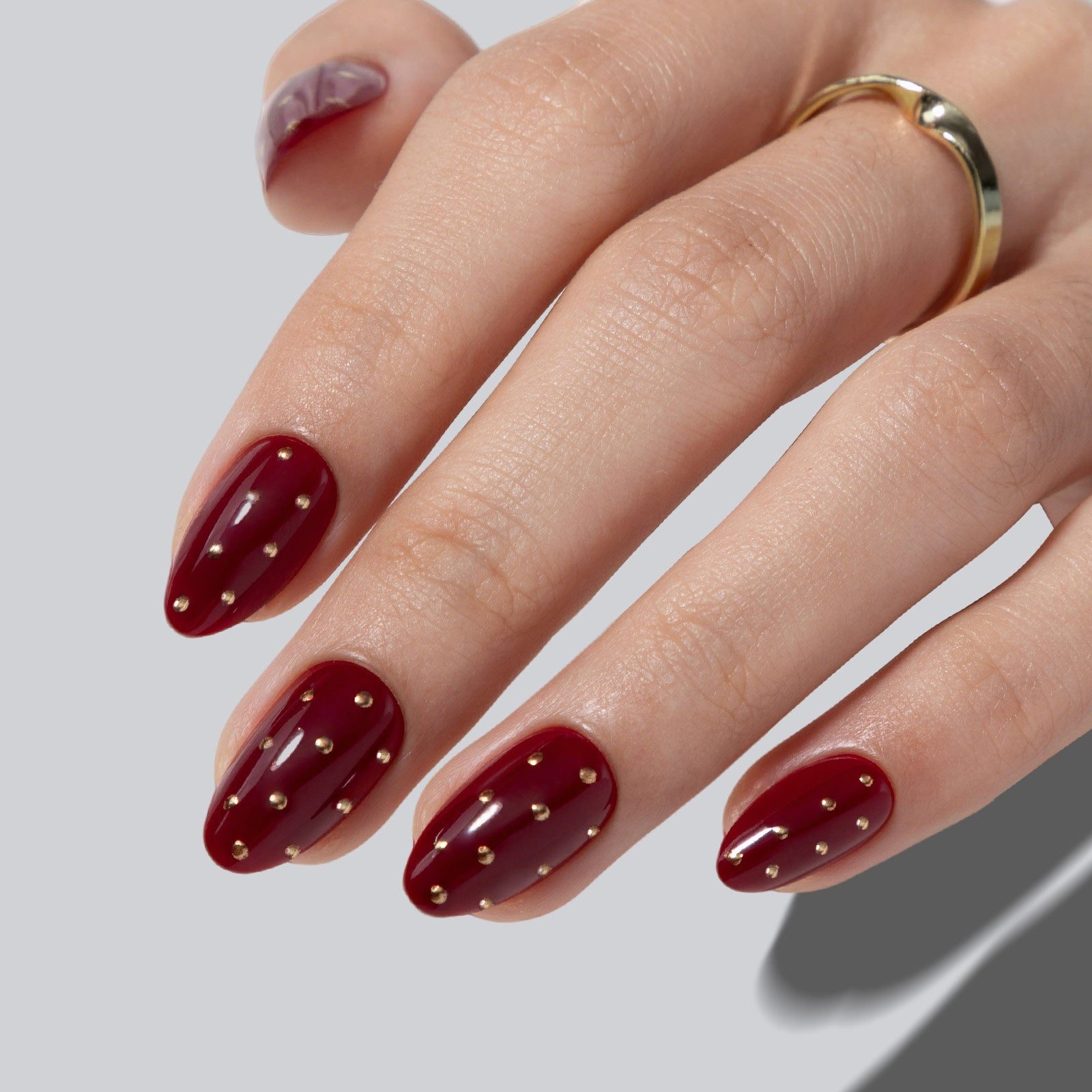 Sophisticated Dark Red with Gold Dot Accents Almond Nails — Dark Red Nails