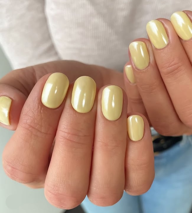 Soft Pale Yellow Glossy Oval — Nails for Women Over 40