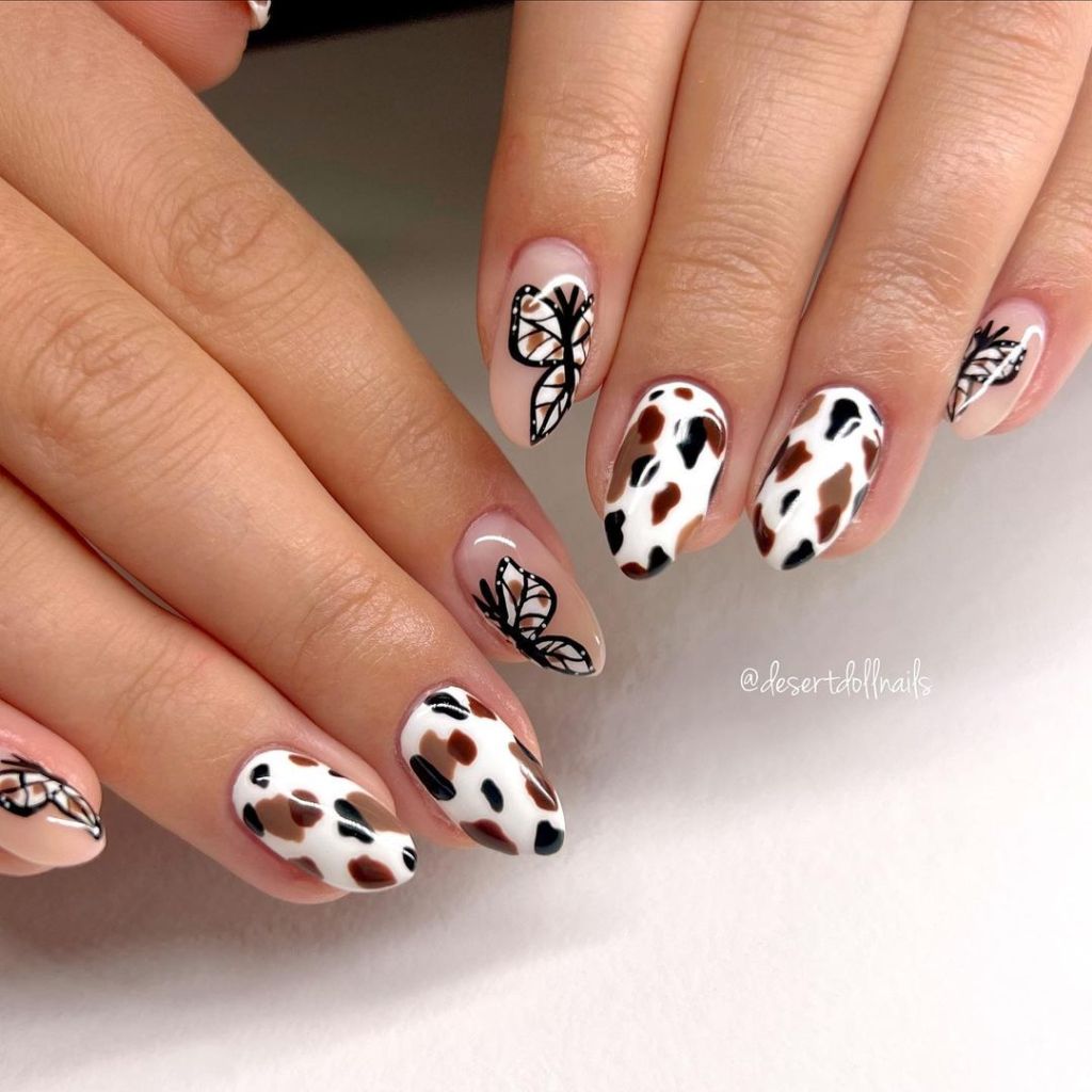 Nude Base Cow Print with Butterfly and Leaf Art Nude Base Cow Print with Butterfly and Leaf Art — Cow Print Nails