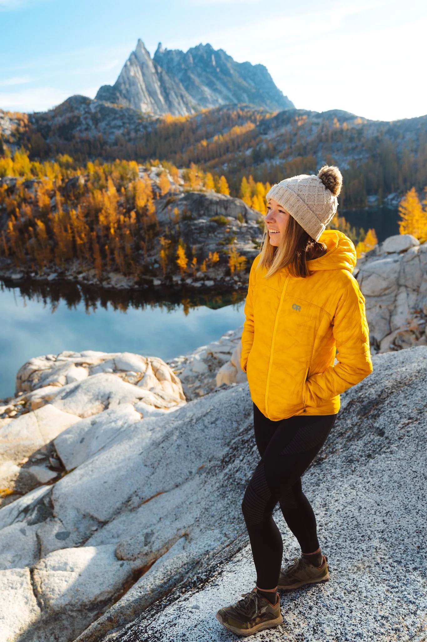 Bright Yellow Puffer Jacket with Black Leggings — Hiking Outfits