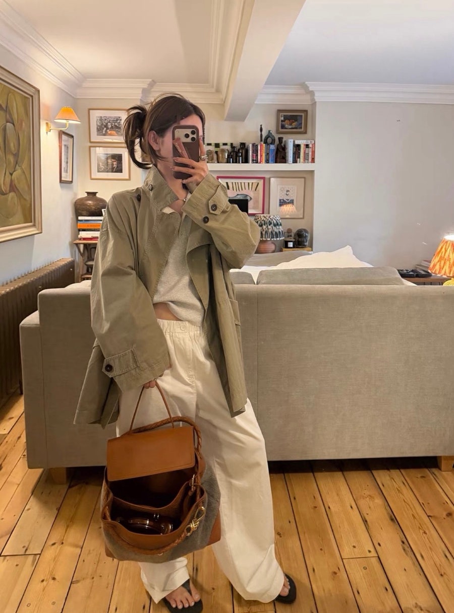 Khaki Trench Coat over Cream Top and White Trousers — Minimalist Outfits