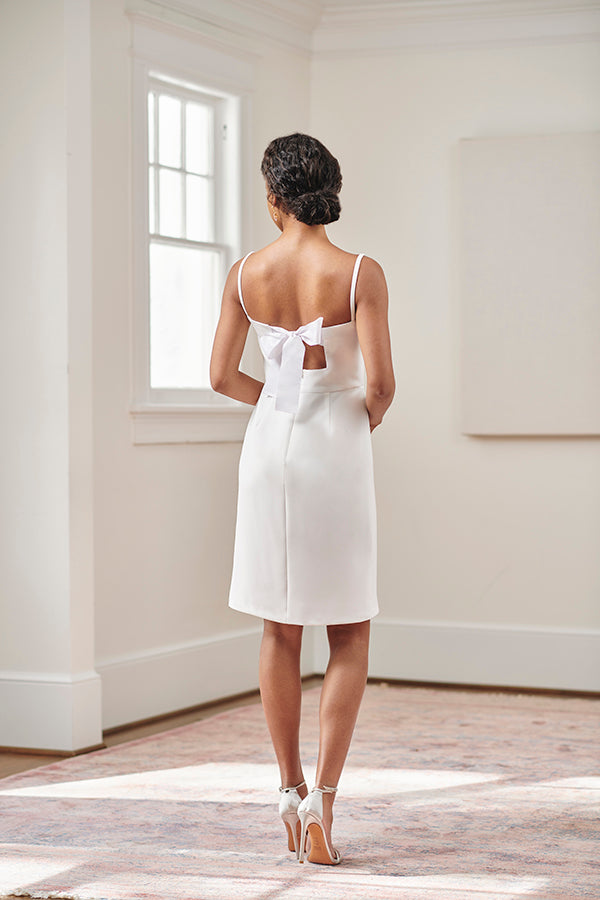 White Strappy Sheath Dress with Back Bow Detail — Rehearsal Dinner Outfits