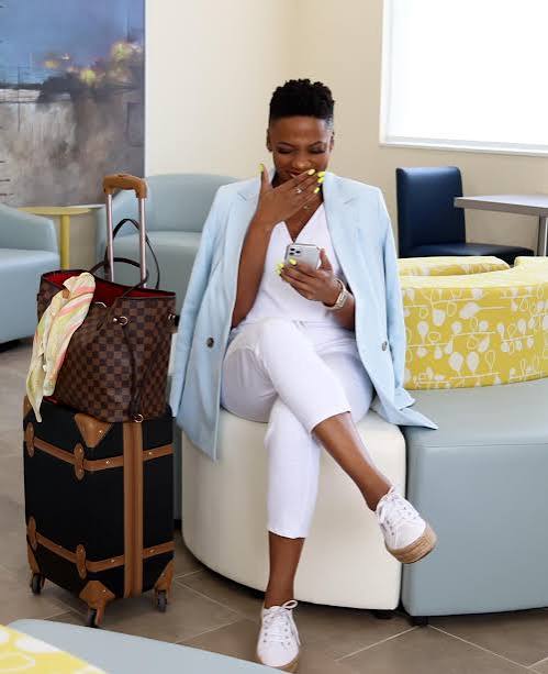 Crisp White Ensemble with a Light Blue Blazer — Airport Outfits
