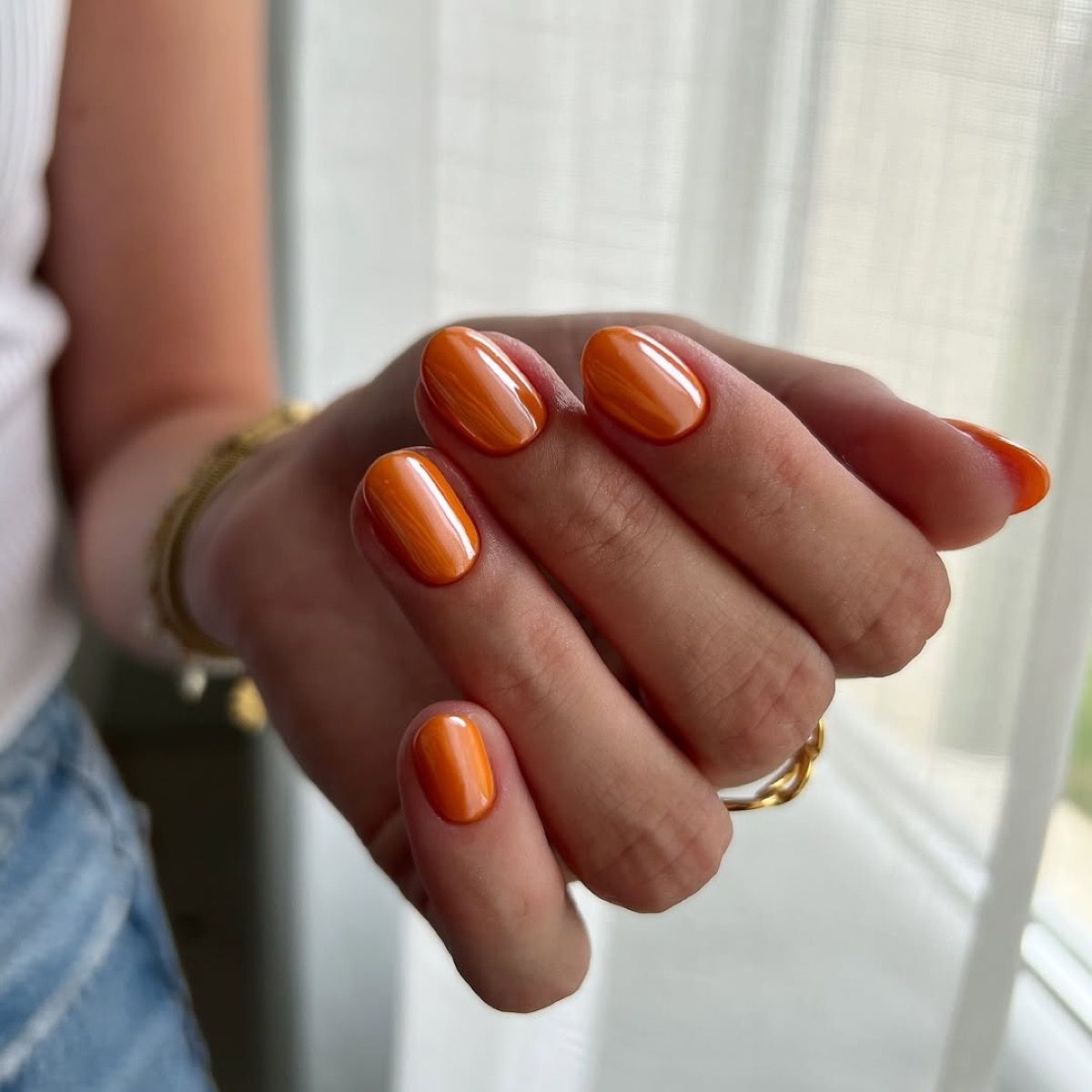 Vibrant Orange With Dark Streaks Glossy Oval Nails Vibrant Orange With Dark Streaks Glossy Oval Nails — Nails for Tan Skin