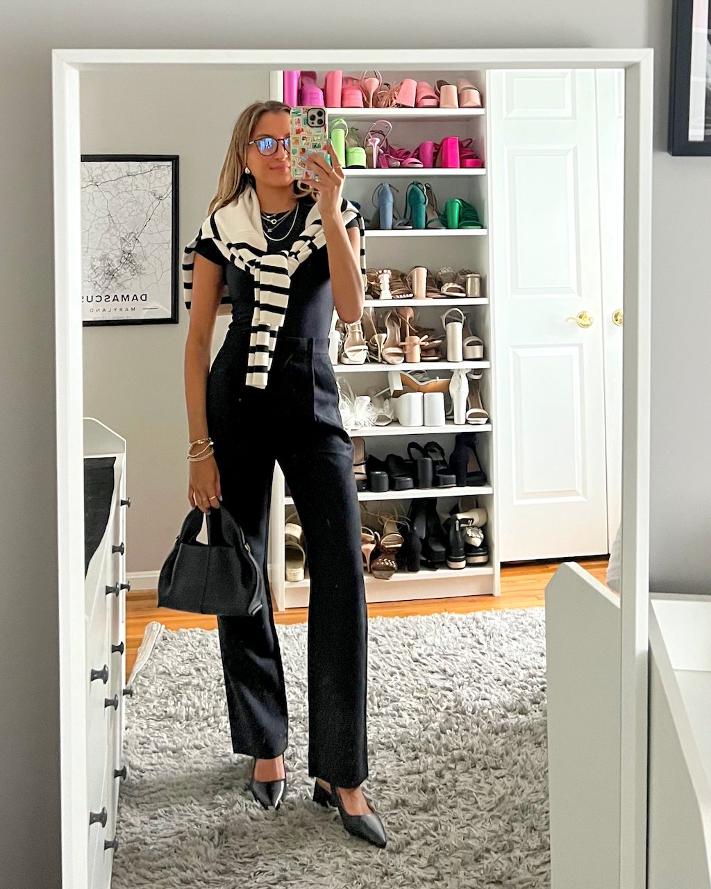 Black Wide-Leg Jumpsuit with Striped Sweater for Chic Workwear Black Wide-Leg Jumpsuit with Striped Sweater for Chic Workwear — Casual Work Outfits