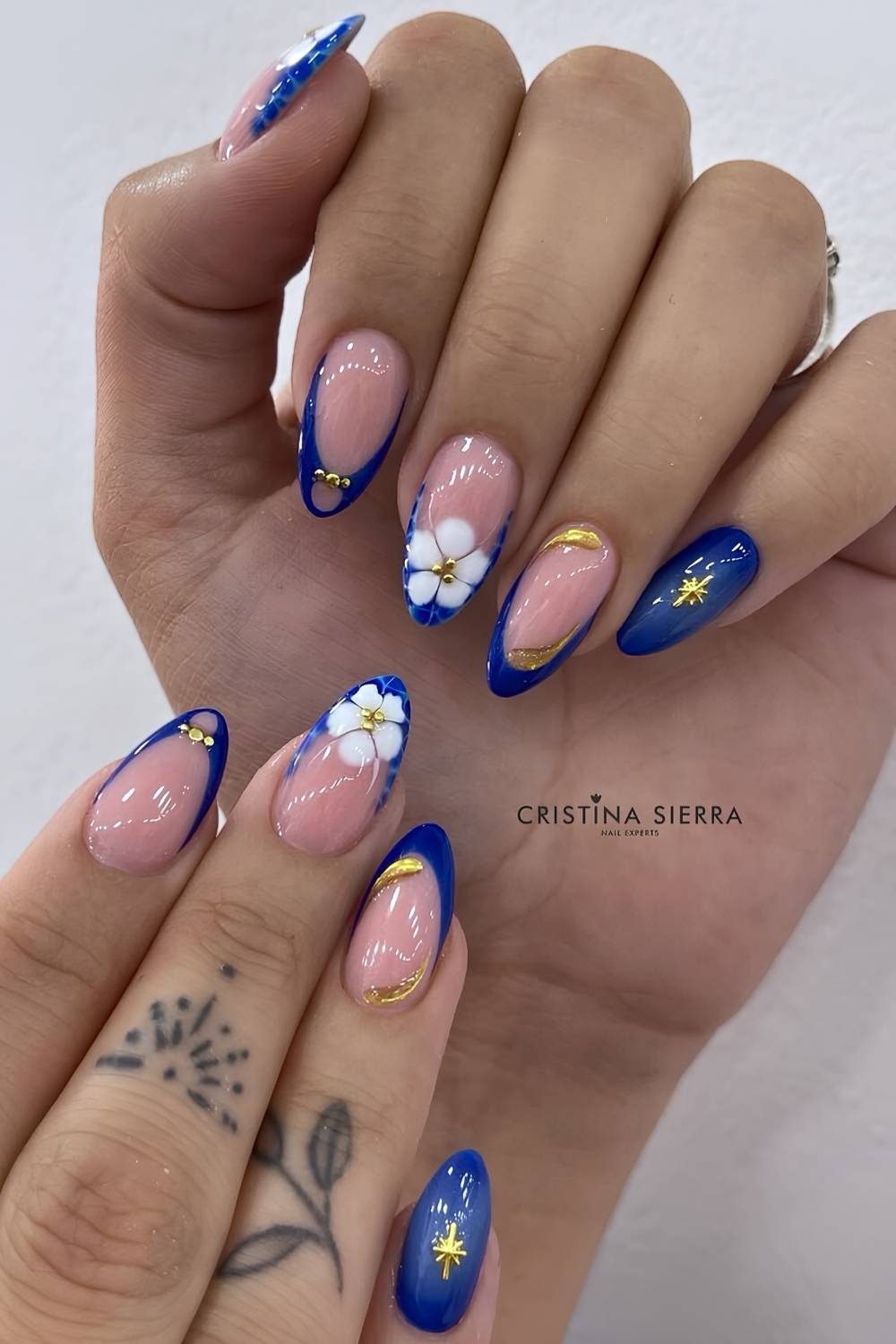Sheer Pink French Tips with Floral & Moon Art Sheer Pink French Tips with Floral & Moon Art — Royal Blue Nails