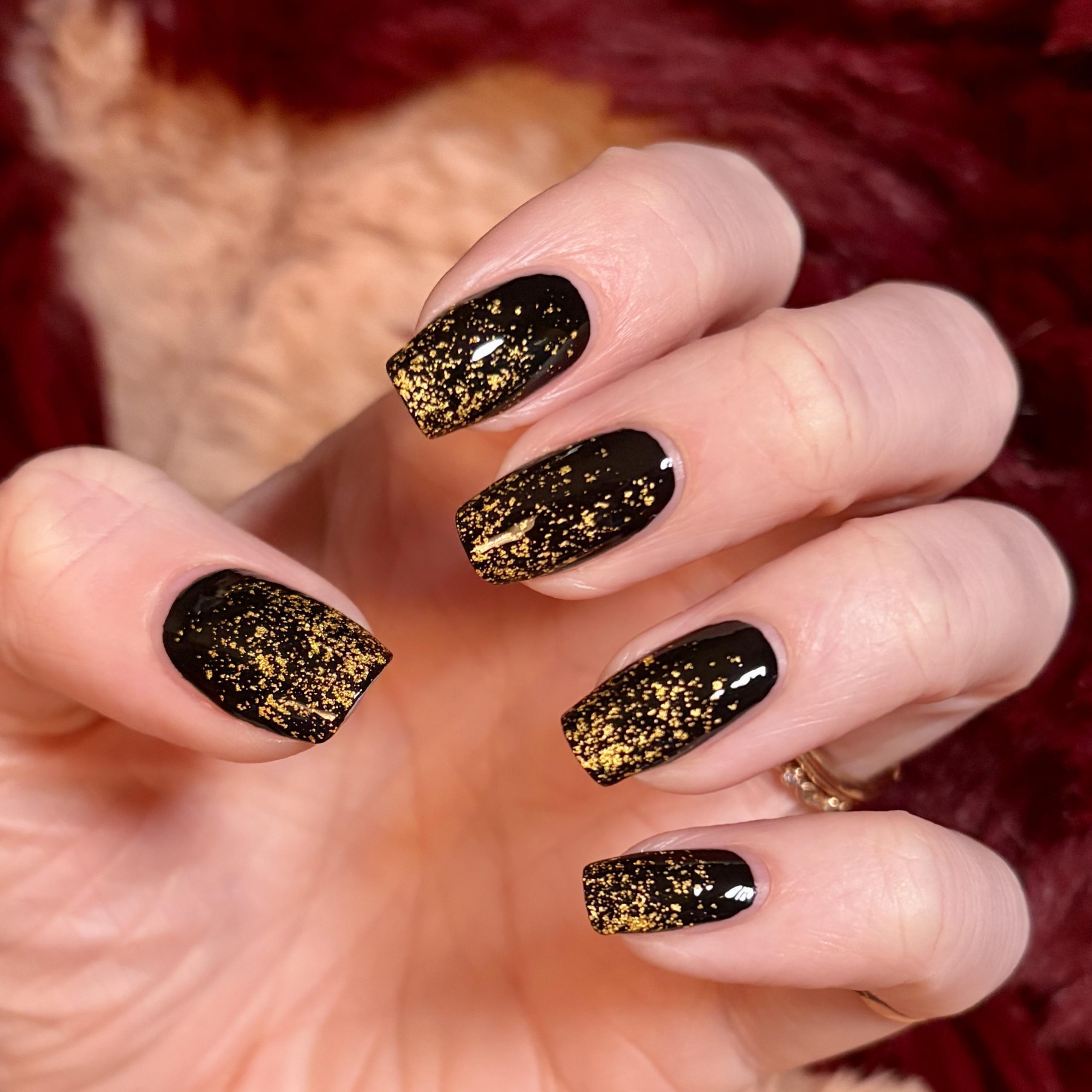 Glossy Black with Scattered Gold Flakes — Black and Gold Nails