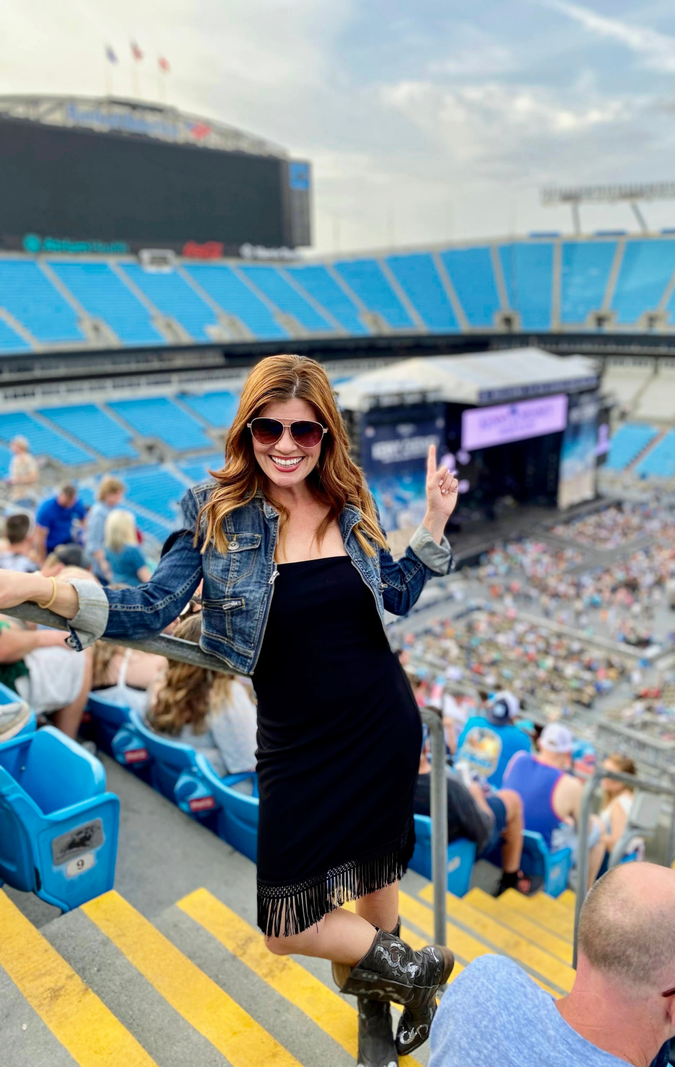 Denim Jacket Over Fringe Hem Strapless Dress with Cowboy Boots Denim Jacket Over Fringe Hem Strapless Dress with Cowboy Boots — Country Concert Outfits