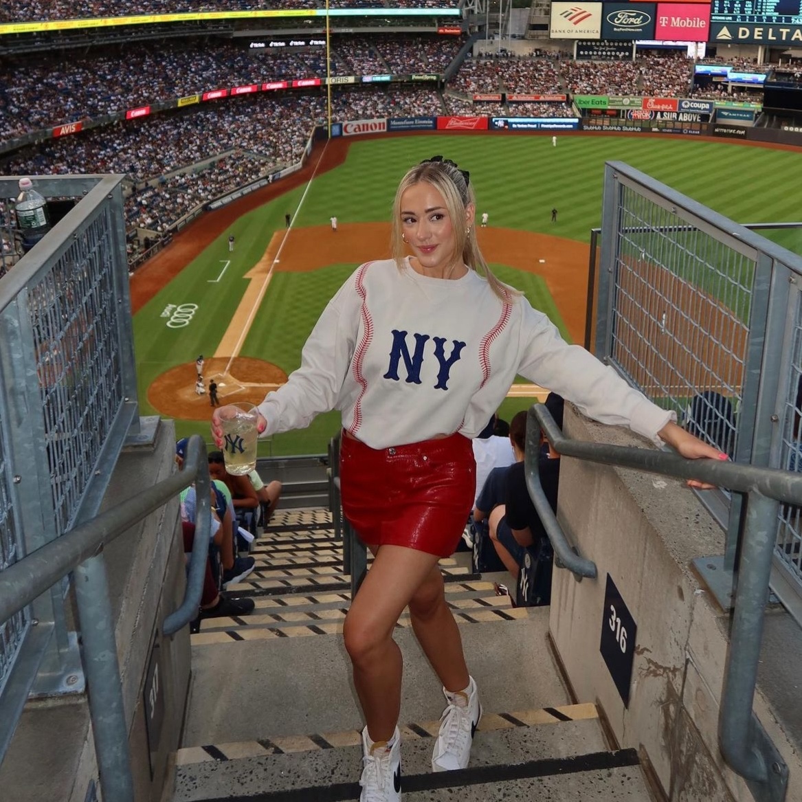 Graphic Sweatshirt as a Jersey Alternative with Mini Skirt Graphic Sweatshirt as a Jersey Alternative with Mini Skirt — Jersey Outfits