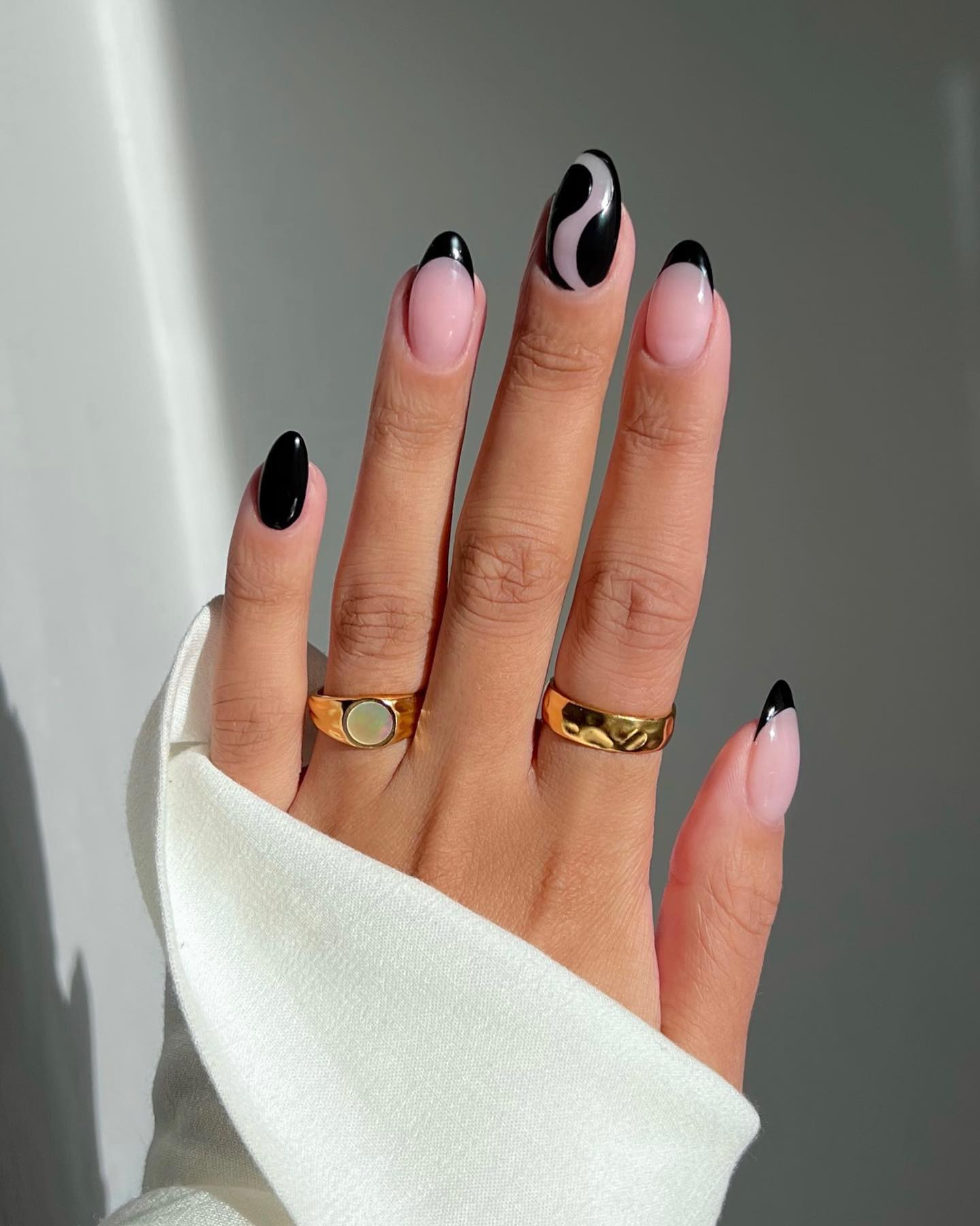 Chic Black French with Abstract Swirl Chic Black French with Abstract Swirl — Negative Space Nails