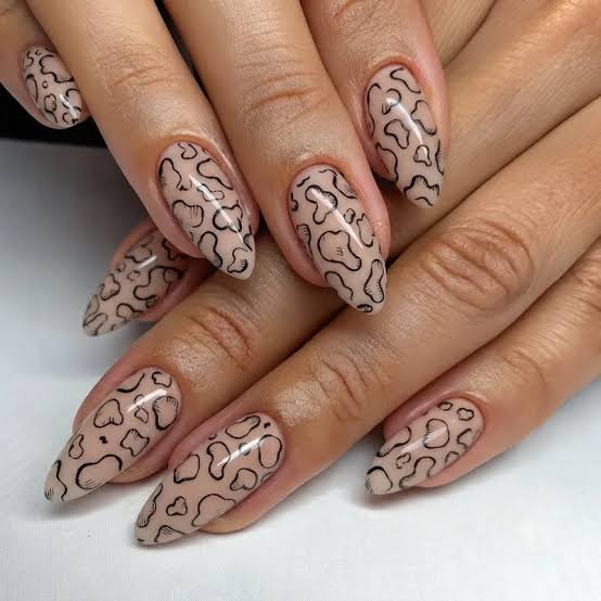 Glossy Continuous Cow Print on Nude Base Glossy Continuous Cow Print on Nude Base — Cow Print Nails