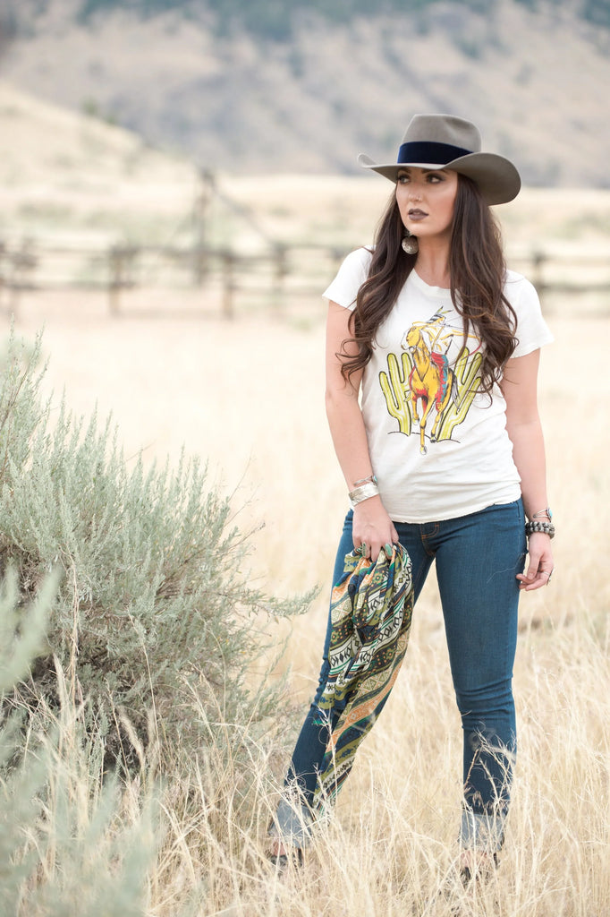 Graphic Cowboy Tee with Jeans and Cowboy Hat Graphic Cowboy Tee with Jeans and Cowboy Hat — Western Outfits