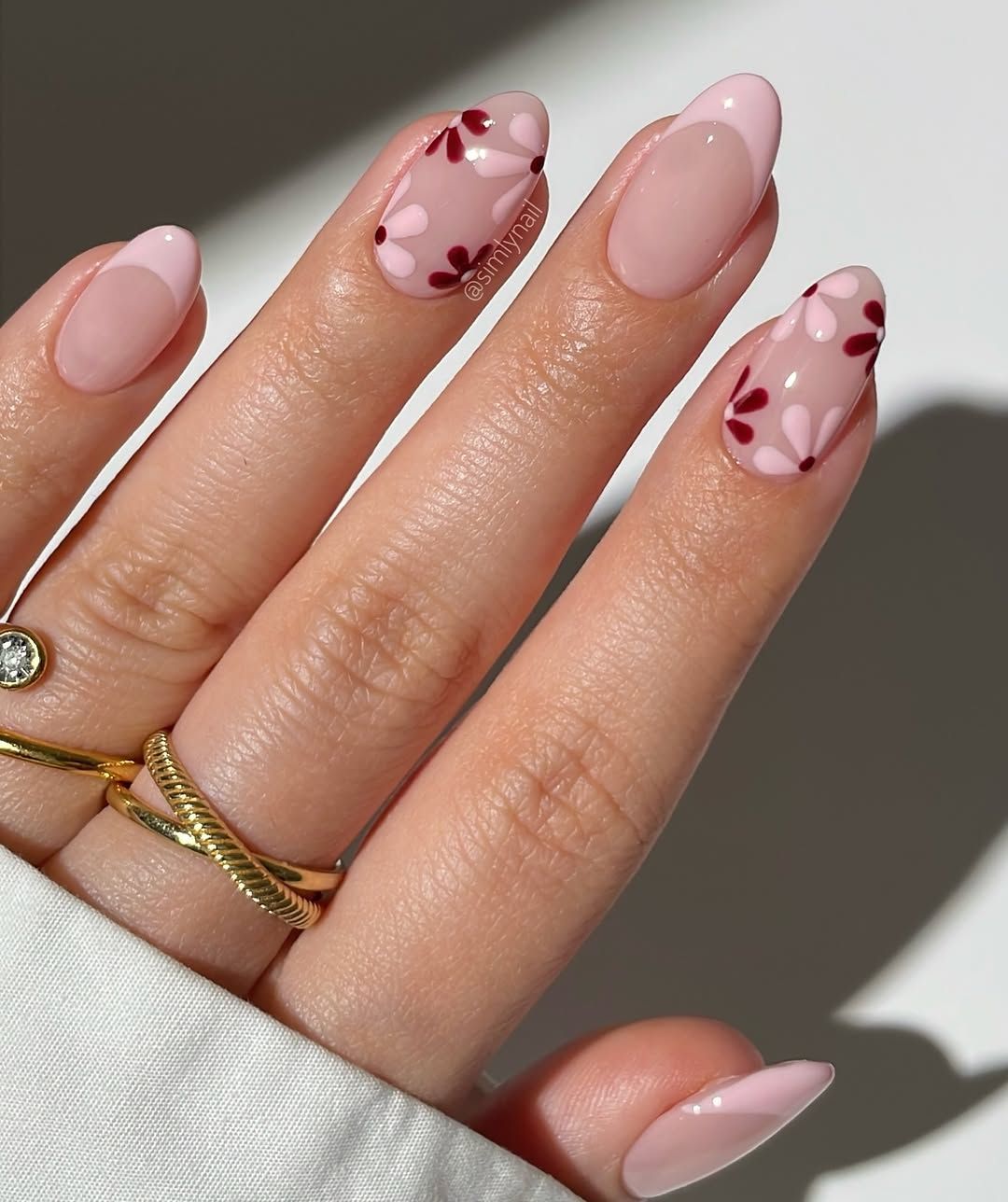 Pinkish Nude French with Floral Accents Pinkish Nude French with Floral Accents — Nude Nails