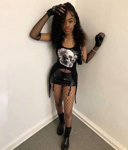 Skull Graphic Tank Top with Faux Leather and Fishnet Accents Skull Graphic Tank Top with Faux Leather and Fishnet Accents — Rockstar Girlfriend Outfits