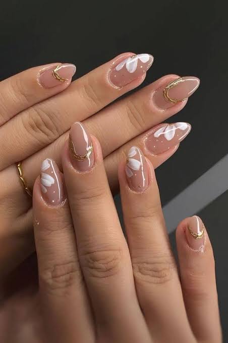 White Floral Designs And Gold Accents Visual Idea — Aesthetic Nails