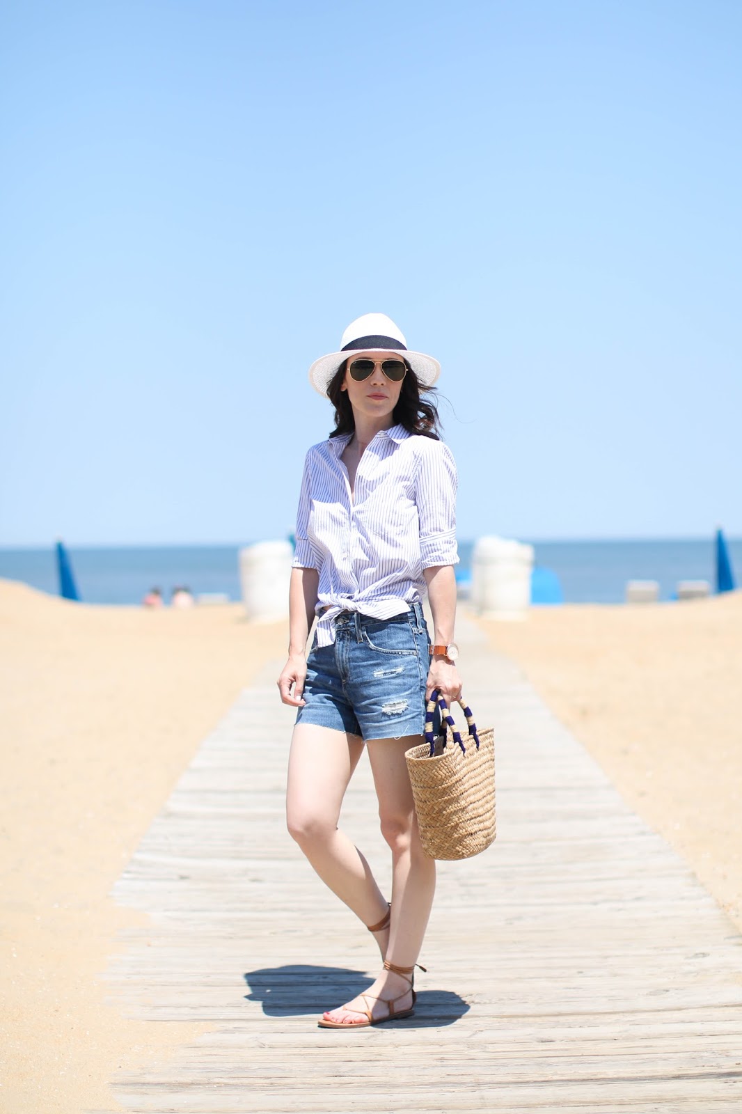 Striped Button-Down Shirt with Denim Shorts and Straw Hat — Beach Outfits