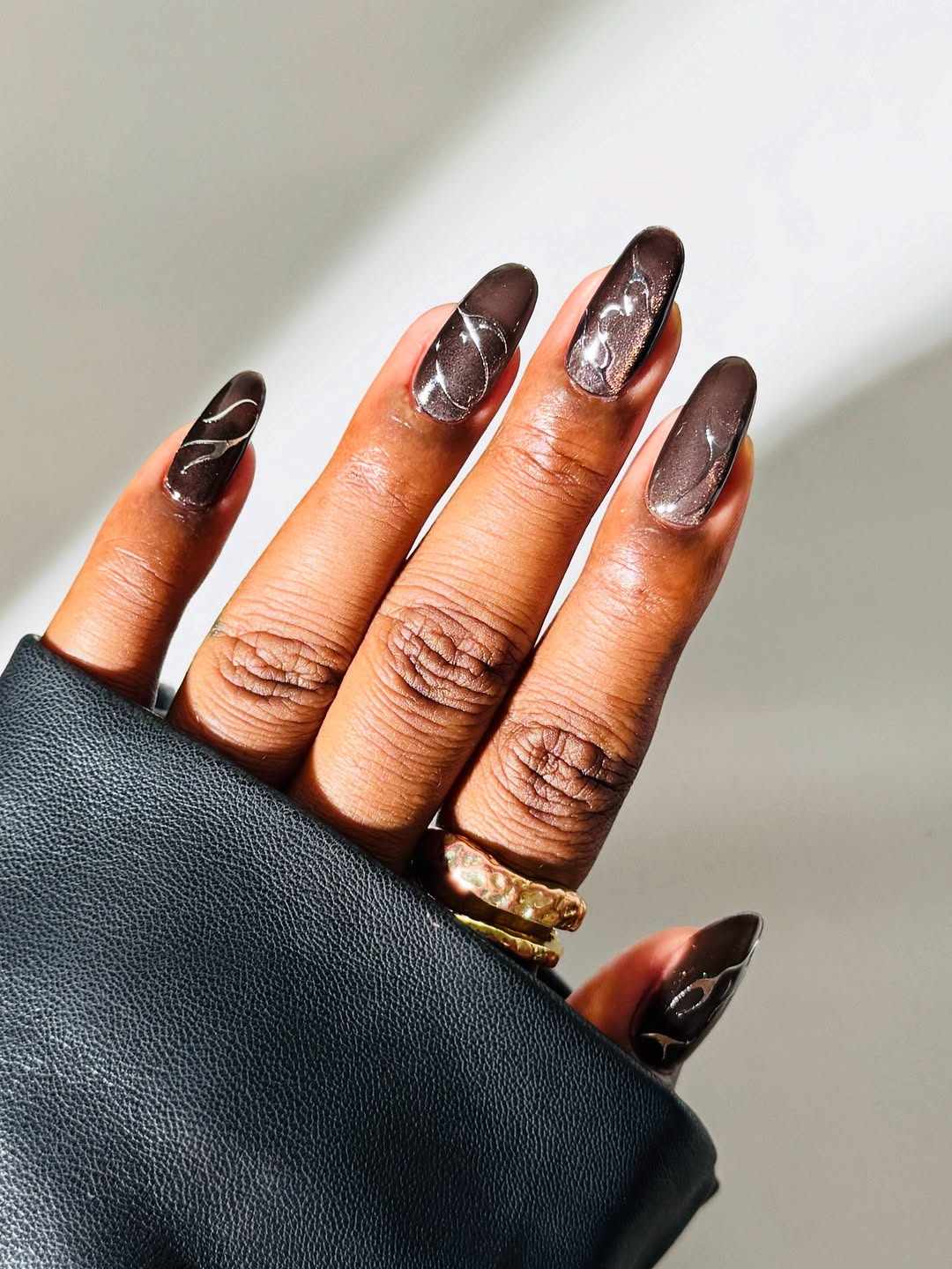 Deep Brown Cat-Eye with Silver Swirls Deep Brown Cat-Eye with Silver Swirls — Nails for Dark Skin