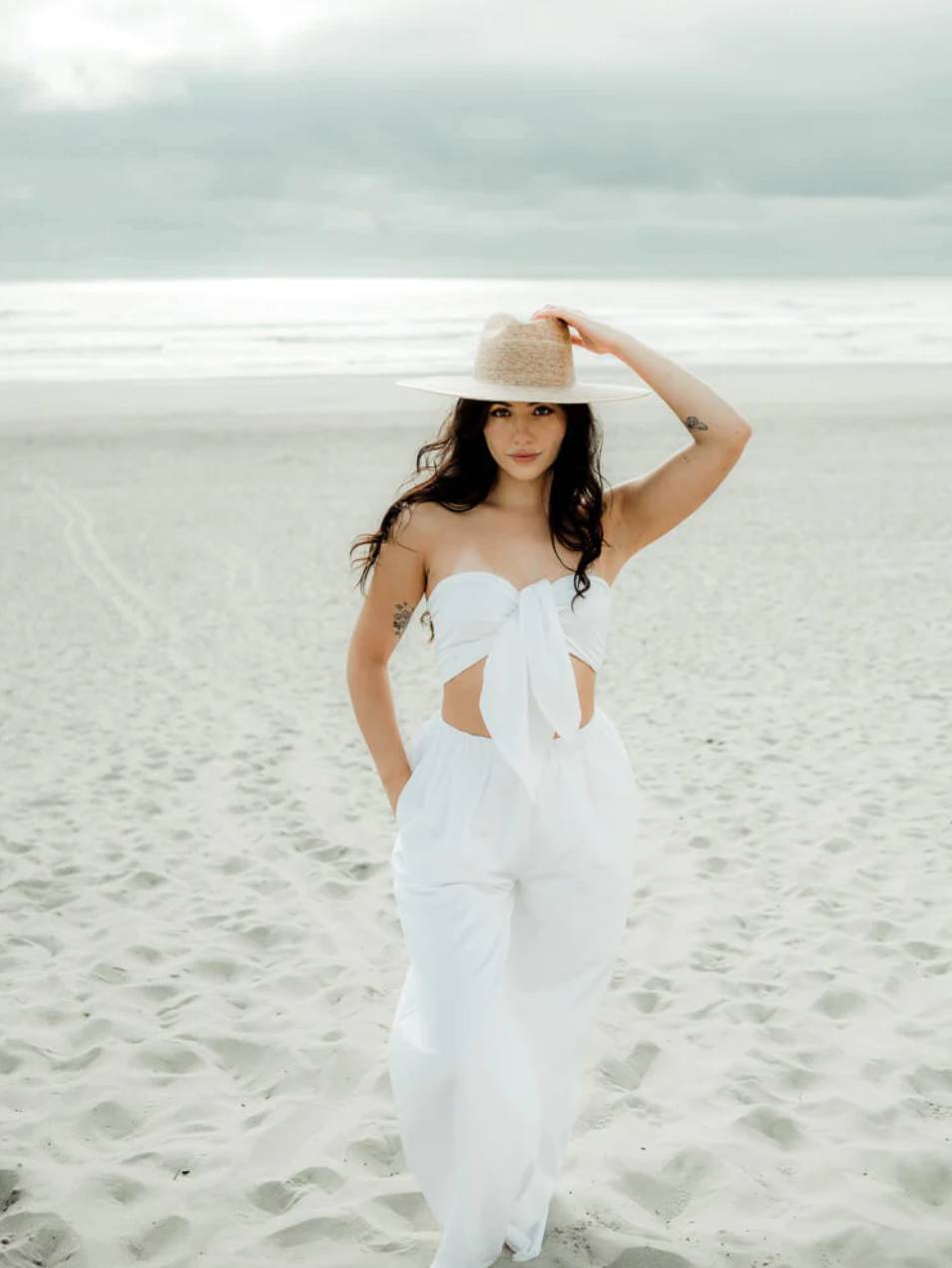 Relaxed Beachwear: White Bandeau Top and Trousers Relaxed Beachwear: White Bandeau Top and Trousers — Honeymoon Outfits