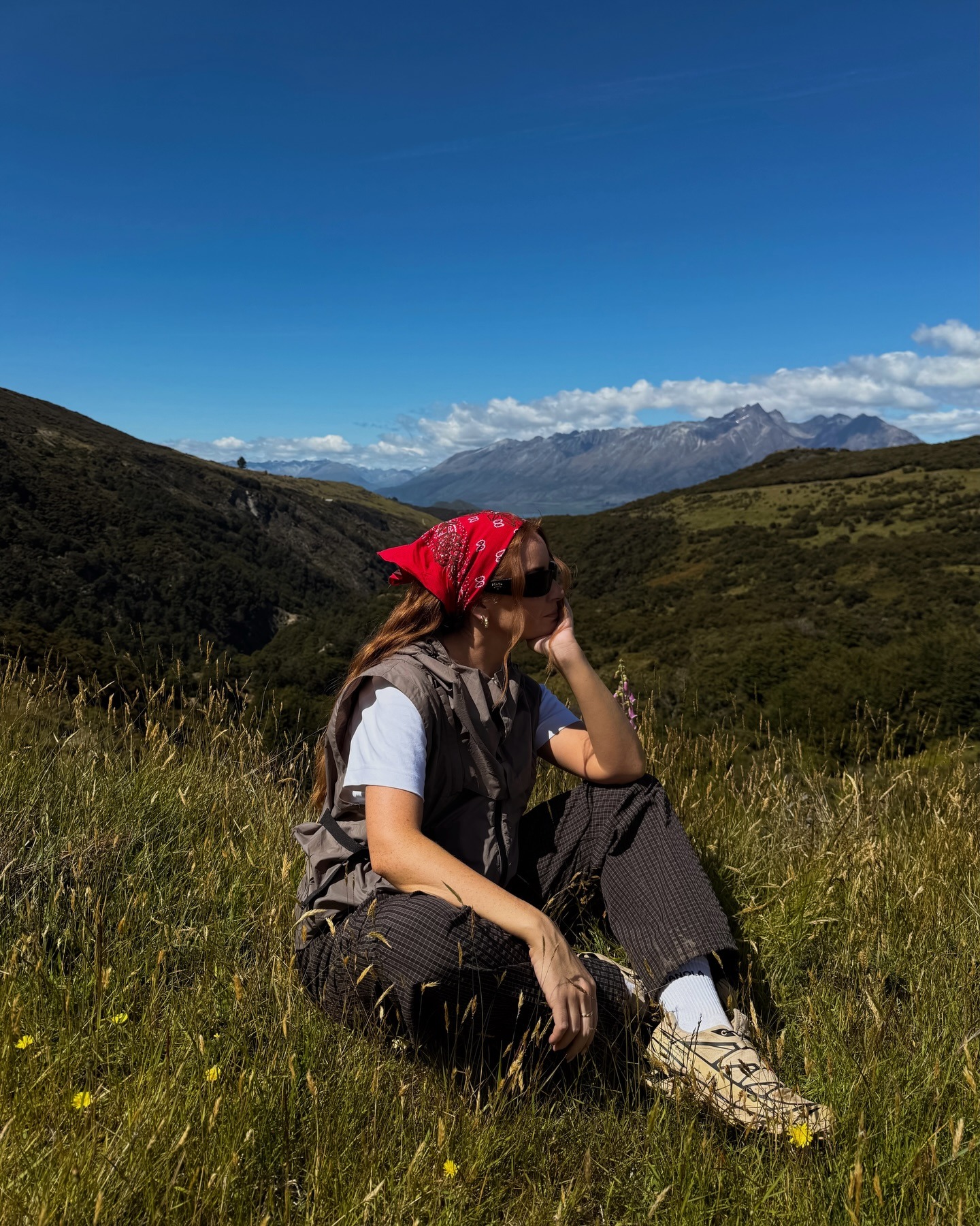 Grey Vest Over White Tee with Patterned Trousers — Hiking Outfits