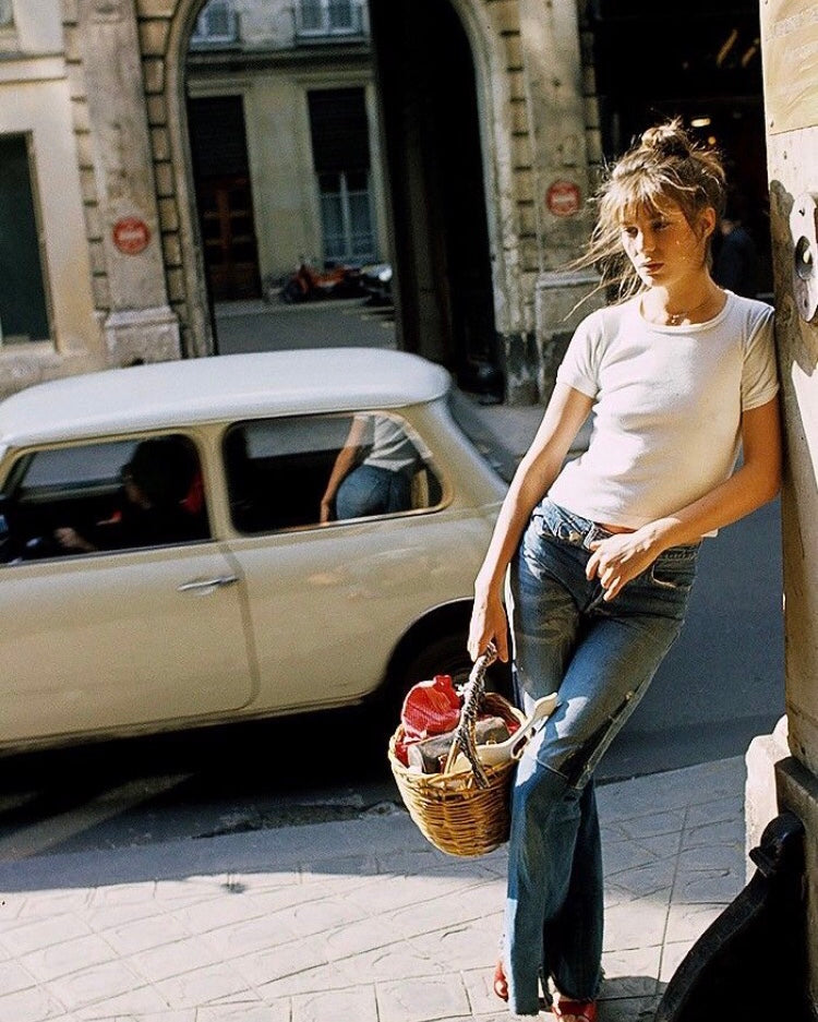 Retro Vibes: White Tee and Flared Jeans with Red Accents — French Girl Outfits
