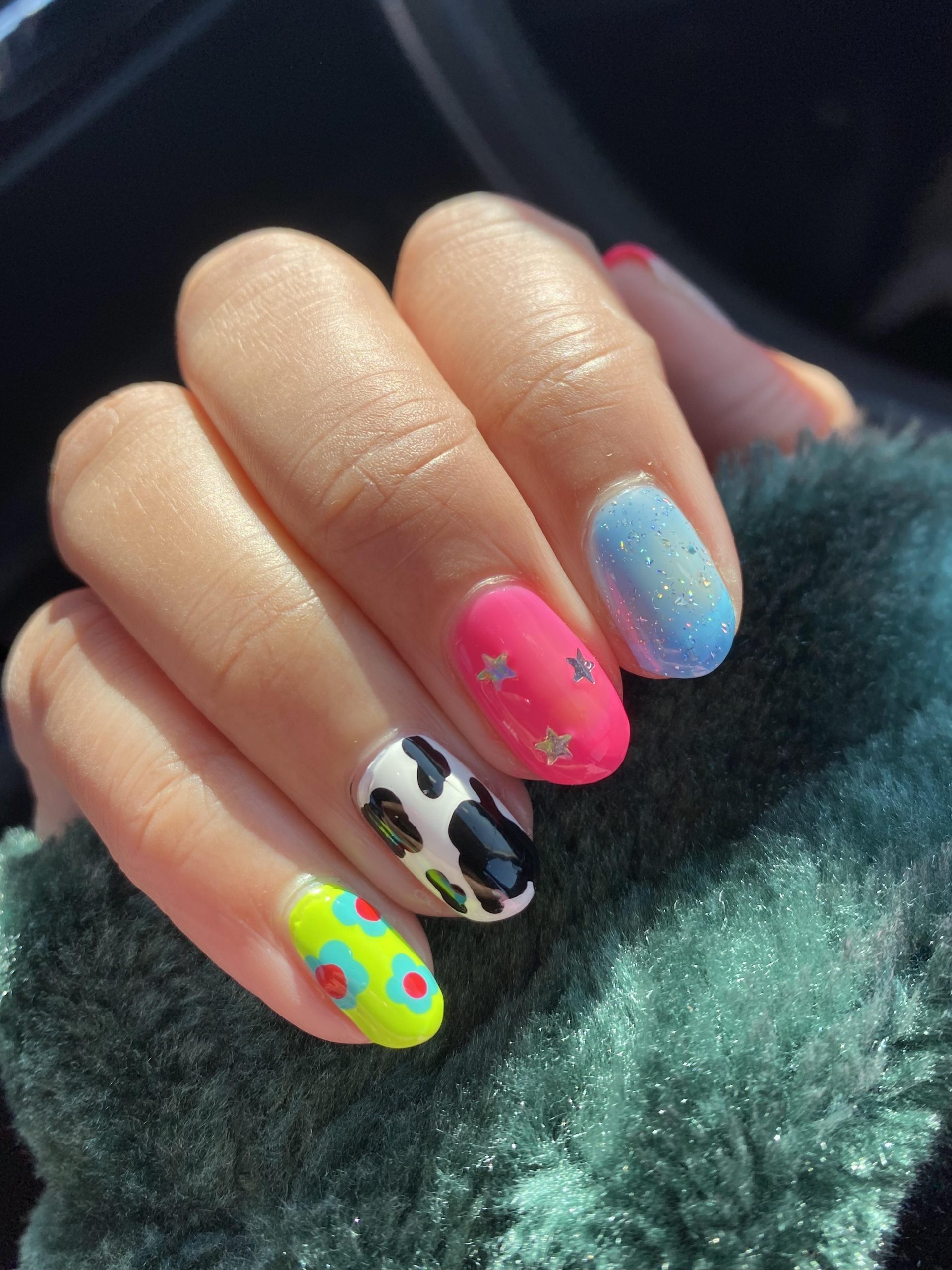 Cow Print with Neon and Glitter Accents — Mismatched Nails