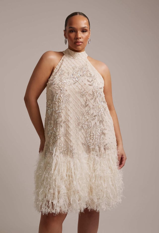 Beaded Mini Dress with Feather Trim for a Festive Bachelorette Party Beaded Mini Dress with Feather Trim for a Festive Bachelorette Party — Bachelorette Outfits