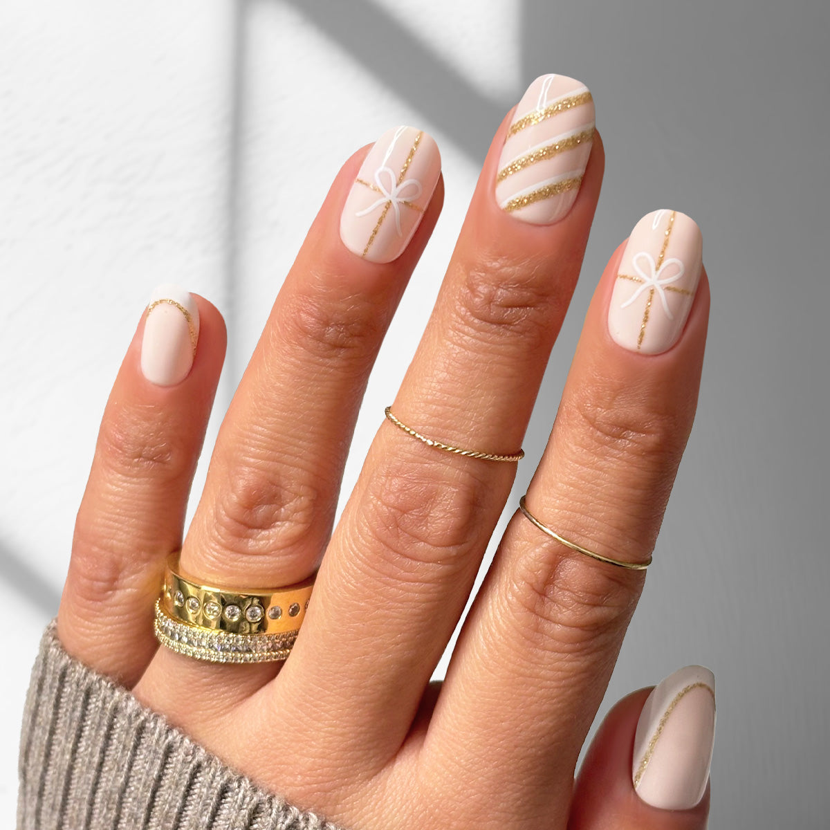 Milky Pink with Gold Bows and Lines Milky Pink with Gold Bows and Lines — Neutral Nails