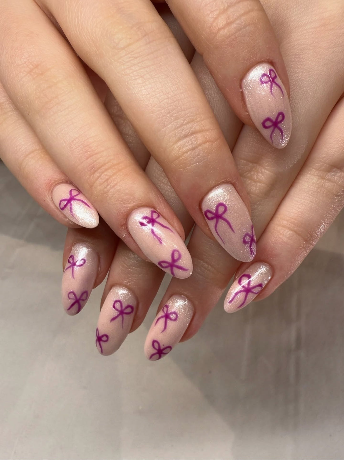 Delicate Hand-Painted Purple Bow Nails Delicate Hand-Painted Purple Bow Nails