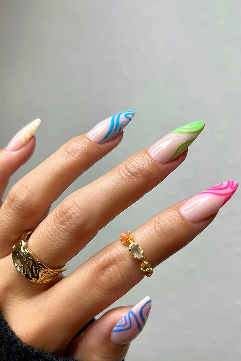 Neon Swirls on Sheer Nude Stilettos Neon Swirls on Sheer Nude Stilettos — Swirl Nails