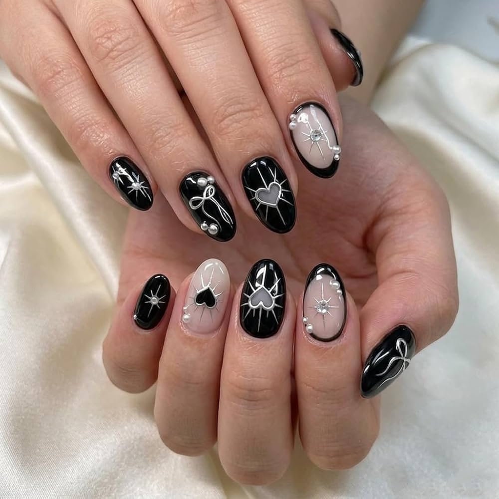 Black Oval Nails with Silver Heart Outlines Black Oval Nails with Silver Heart Outlines — Coquette Nails