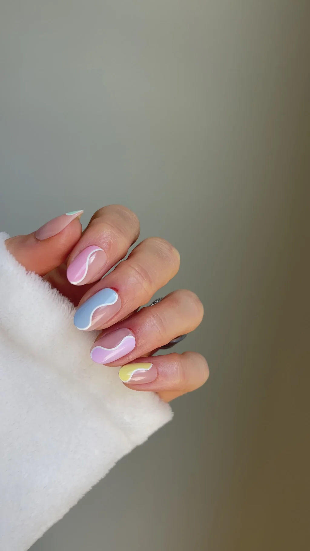 Pastel Wavy Lines on Sheer Nude Pastel Wavy Lines on Sheer Nude — Short Almond Nails
