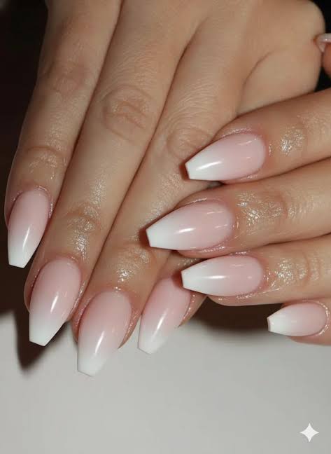 One Hand Close-Up Seamless Pink to White Ombre Medium Coffin — Coffin Nails