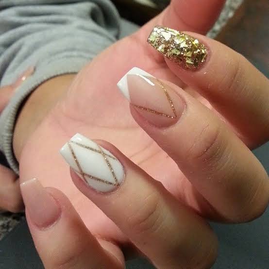 Festive Nude French with Gold Glitter Accents — Short Coffin Nails