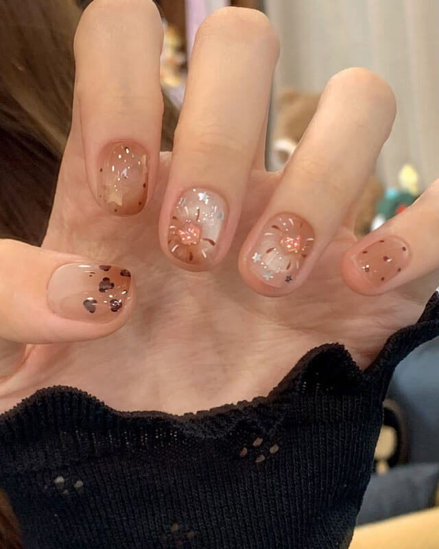 Nude Base With Brown Dots, Stars, And Hearts — Very Short Nails