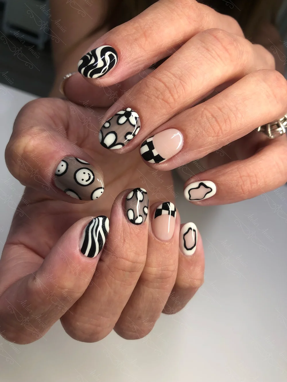 Mixed Graphic Designs Oval — Short Acrylic Nails