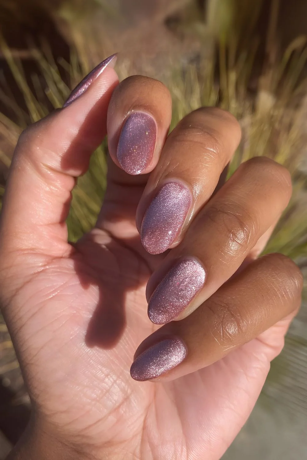 Close-Up Of One Hand Showing Four Nails Visual Idea — Mauve Nails