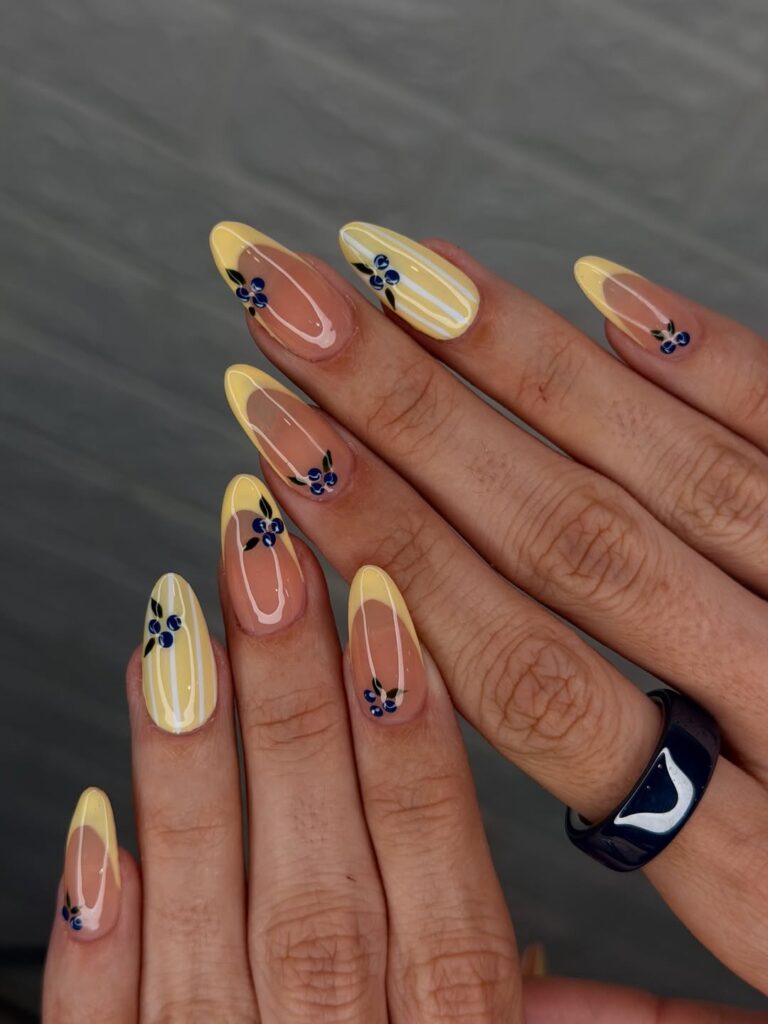 Visual Idea — Some Nails Have White Vertical Stripes — Yellow Nails