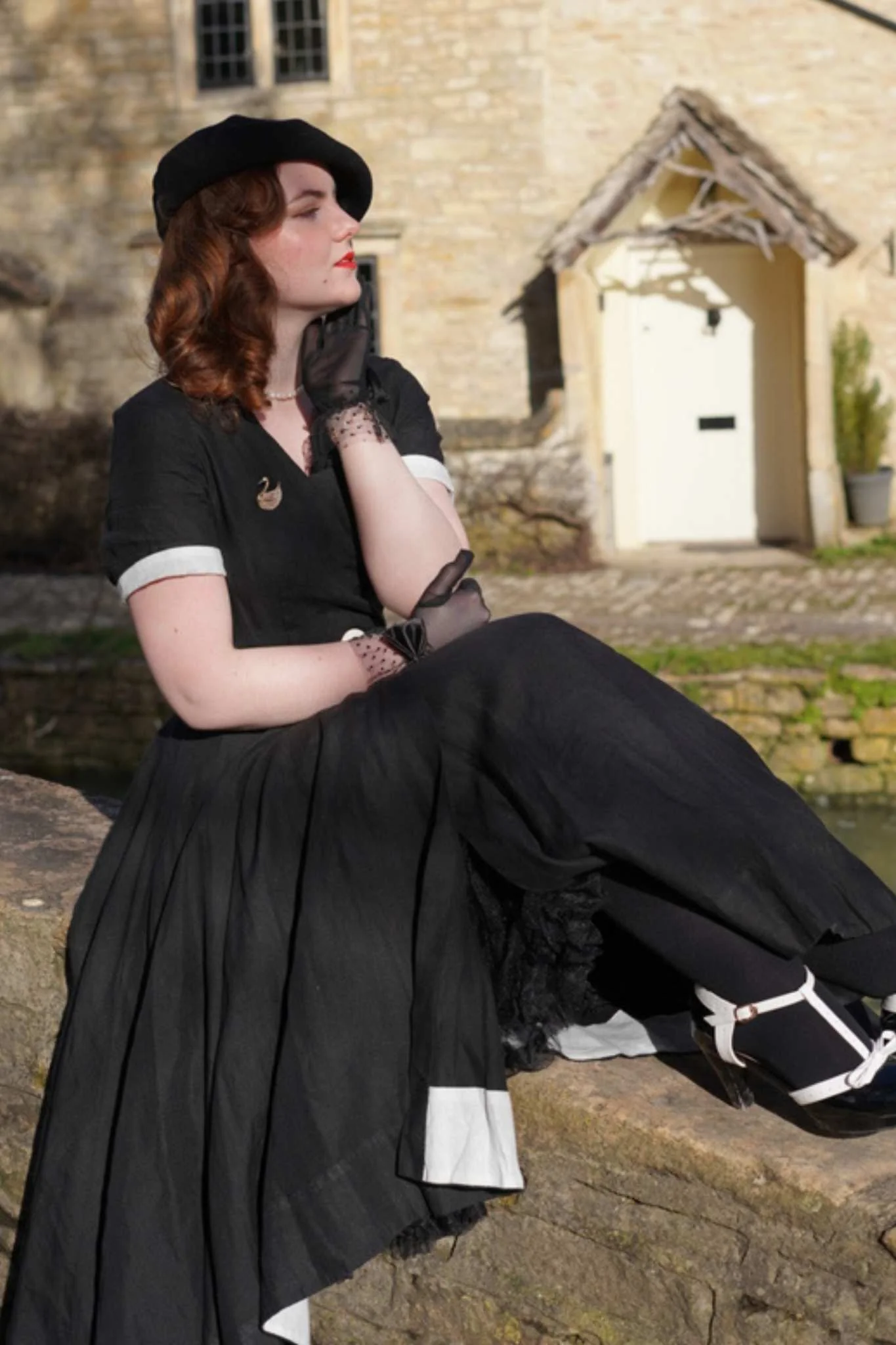 Monochromatic Contrast: Black Midi with White Cuffs Monochromatic Contrast: Black Midi with White Cuffs — 50s Outfits
