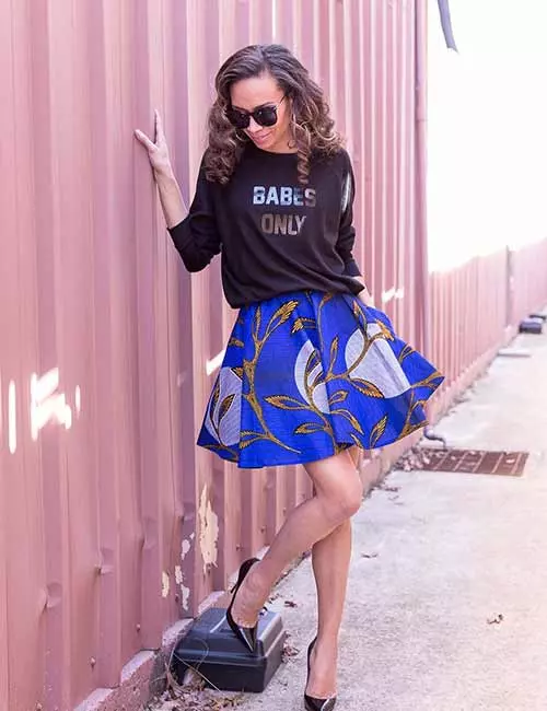 Graphic Sweatshirt Paired with a Vibrant Floral A-Line Skirt Graphic Sweatshirt Paired with a Vibrant Floral A-Line Skirt — Skater Outfits