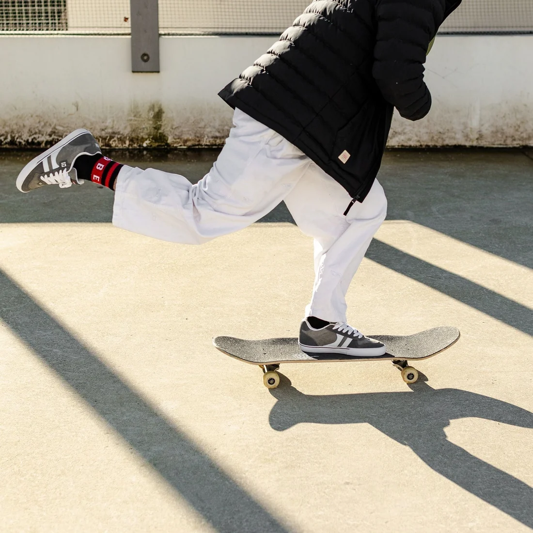 Puffer Jacket and Wide-Leg Trousers with Bold Striped Socks Puffer Jacket and Wide-Leg Trousers with Bold Striped Socks — Skater Outfits