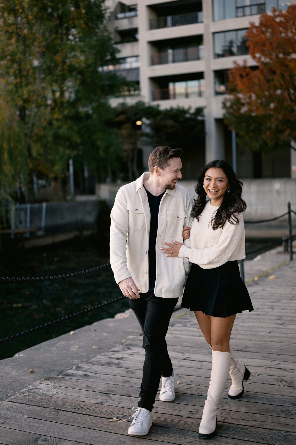 Urban Explorer Engagement: Fleece Jacket and Pleated Skirt Urban Explorer Engagement: Fleece Jacket and Pleated Skirt — Engagement Photo Outfits