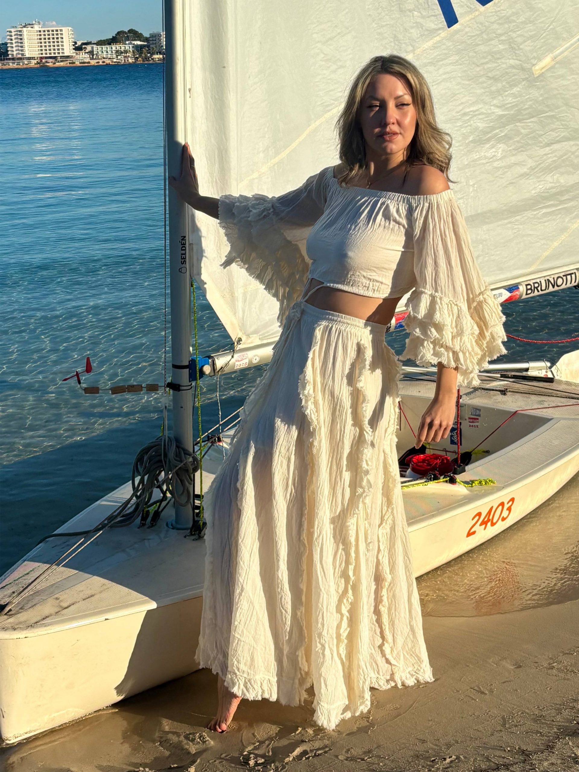 White Off-the-Shoulder Set with Ruffles for a Bohemian Beach Look — Ibiza Outfits